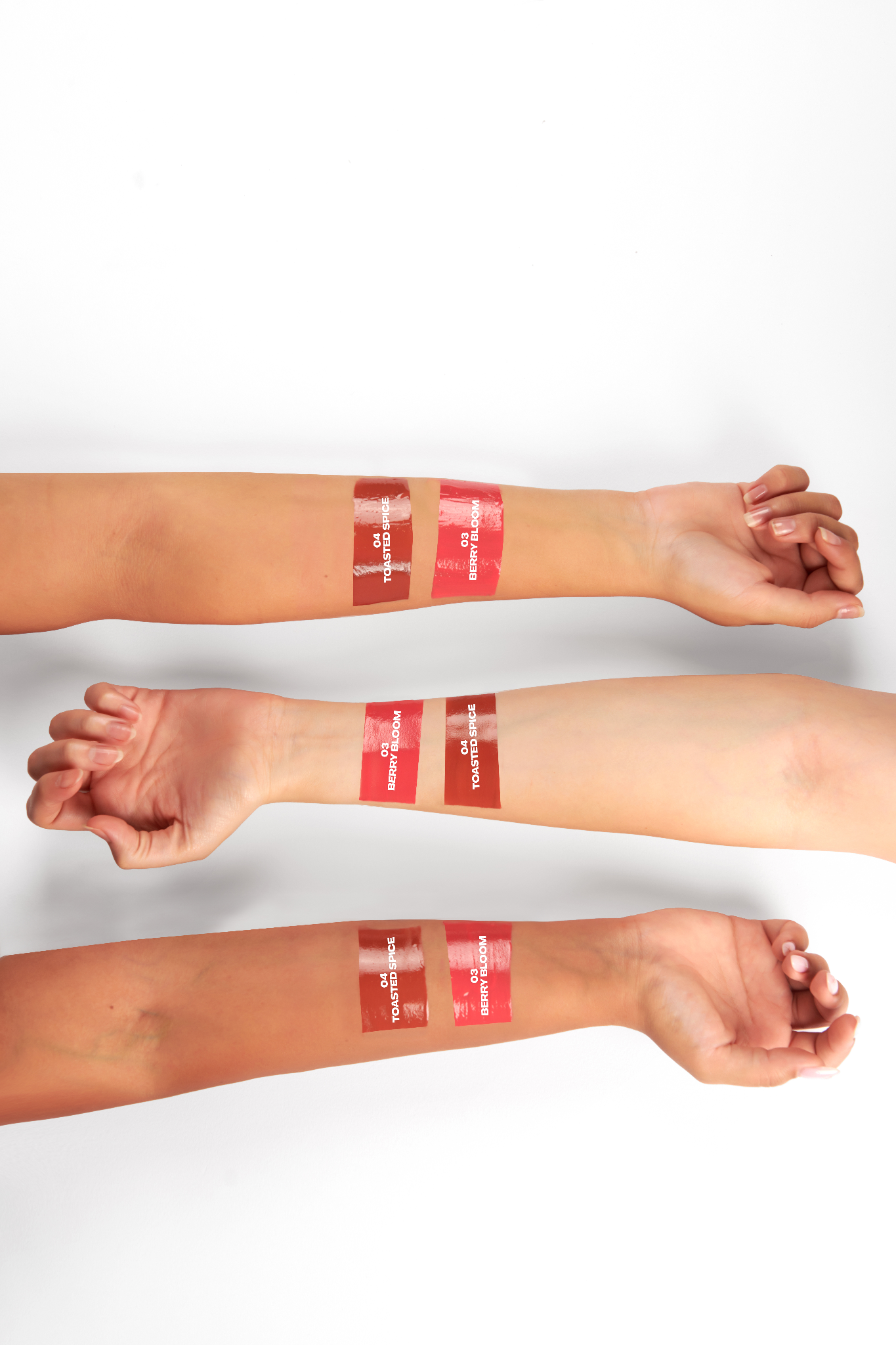 Two arms with red bandages